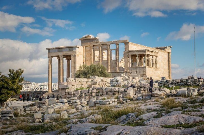 The Erechtheion erected on the north side of the Acropolis was a temple dedicated to Athena and Poseidon.