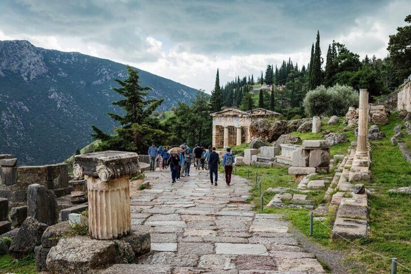 About 180 km northwest of Athens, at the foot of Mount Parnassos lies the sanctuary of Delphi which was regarded as the centre of the world in ancient Greece.