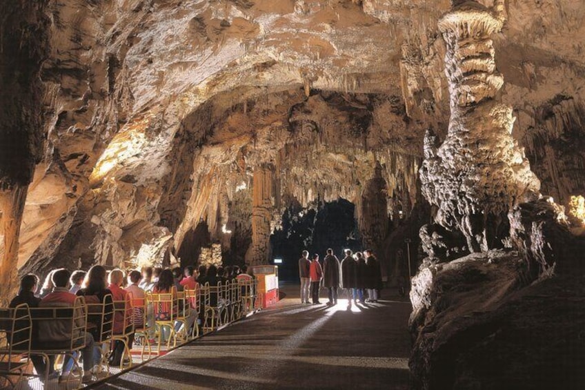 Train ride inside Postojna Cave