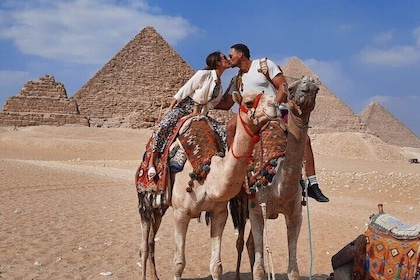 4 Hours private Giza Pyramids ,Sphinx ,lunch and camel ride from Cairo or G...