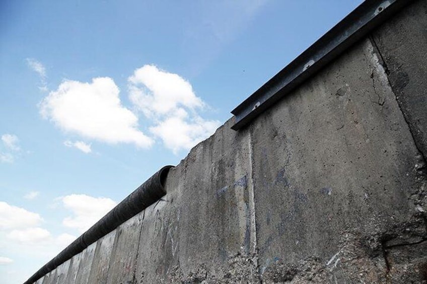 Stand before the infamous Berlin Wall, and hear tales of daring escapes