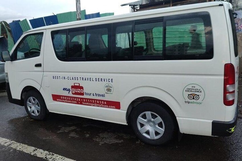 An AC equipped minibus ready for customer pickups