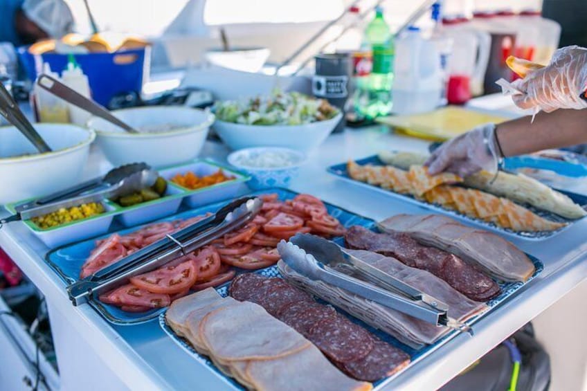 Cold cuts and fresh vegetables make an appearance at lunchtime, onboard a catamaran cruise off Puerto Rico.