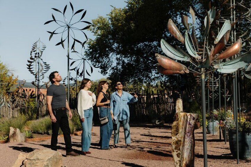 A tour group checking out the wind sculpture garden at one of the galleries on Canyon Road!