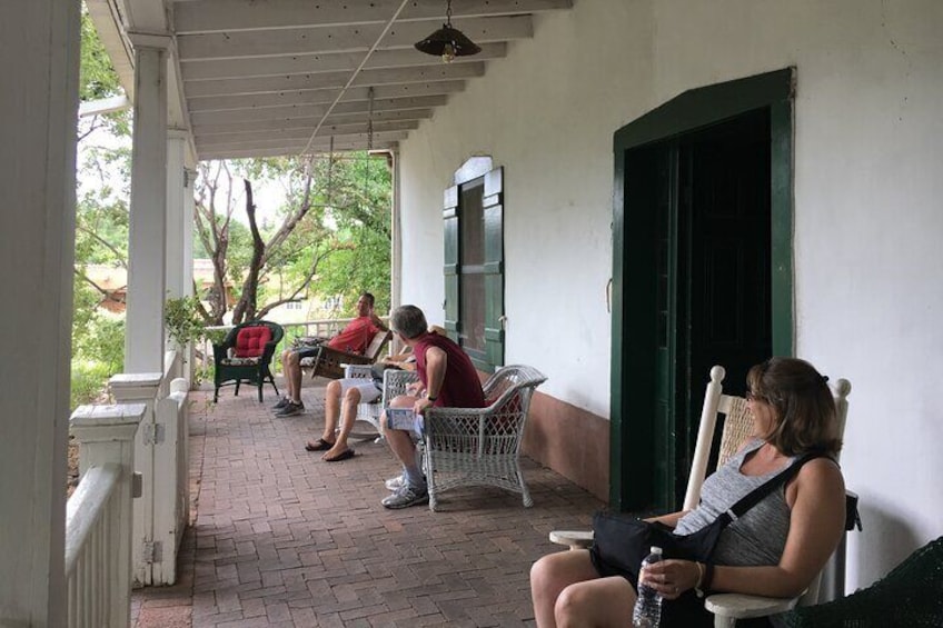 Taking a moment to chat and enjoy the gardens at a historic site on Canyon Road