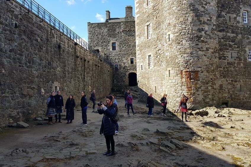 Our group and guides exploring the inside of Blackness Castle (Fort William)