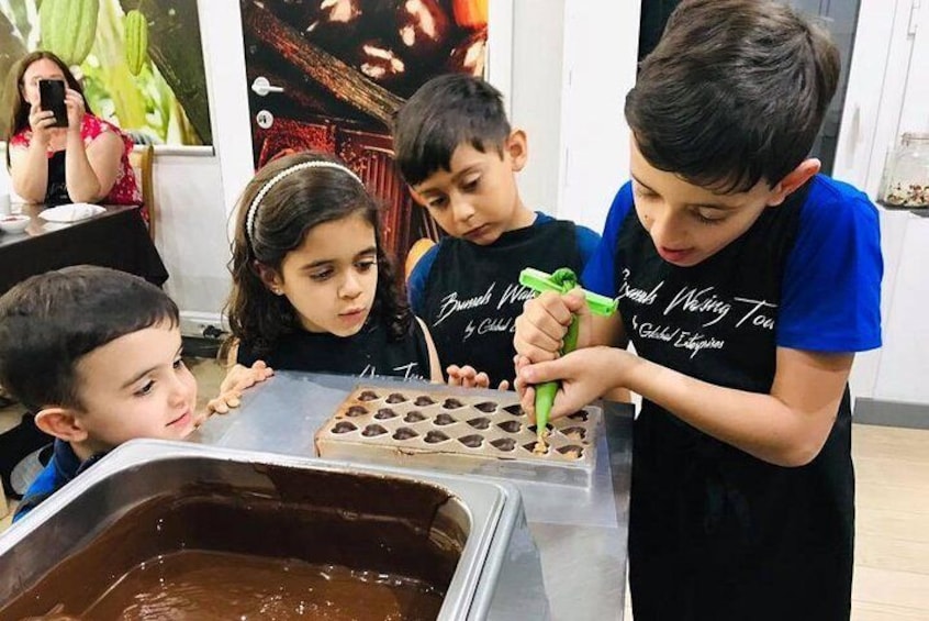Learn how to make pralines during the chocolate workshop