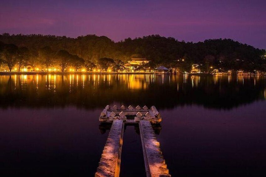 Temple of the tooth relic. An evening view over the beautiful Kandy lake