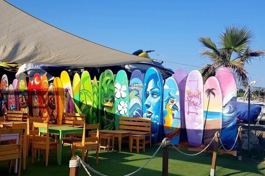 Chill out at a cool beach bar near Torre de Benalgabón. 