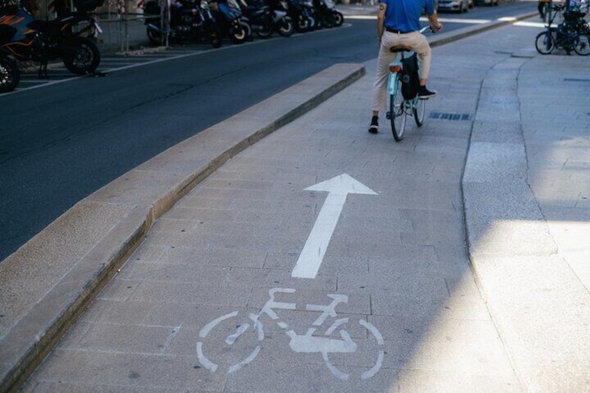 Cycling on Via Verdi bike lane