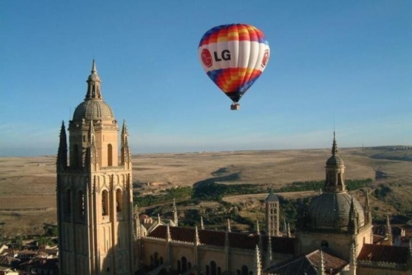 Hot-air balloon over the Cathedral in Segovia