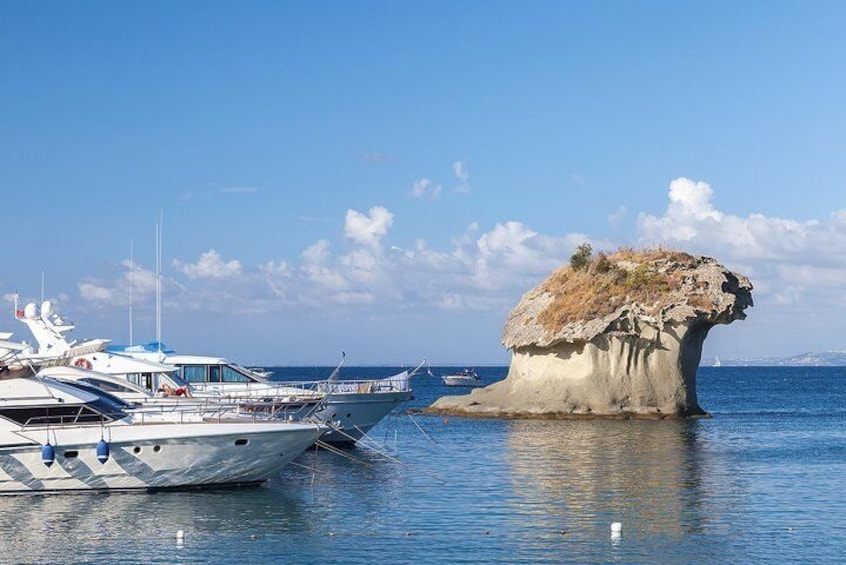 See the iconic Fungo - a mushroom shaped rock in Lacco Ameno