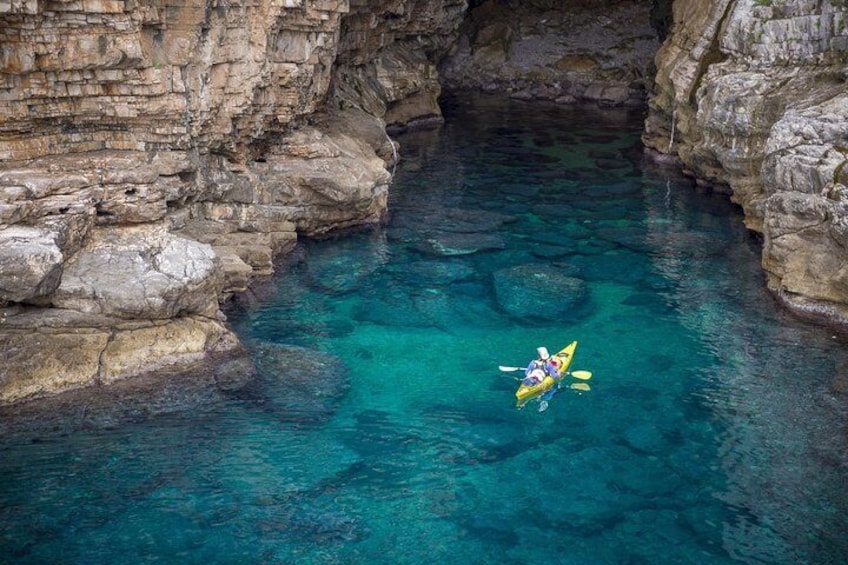 Adventure Dubrovnik guide Kreso leading guests to a Lokrum Island cave.