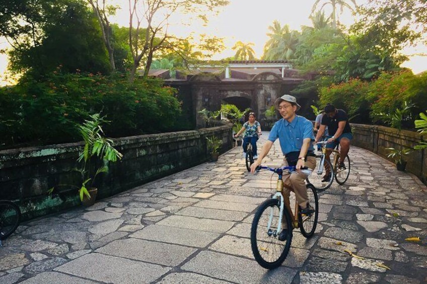 Bike through the different walled gardens as the sun is setting 