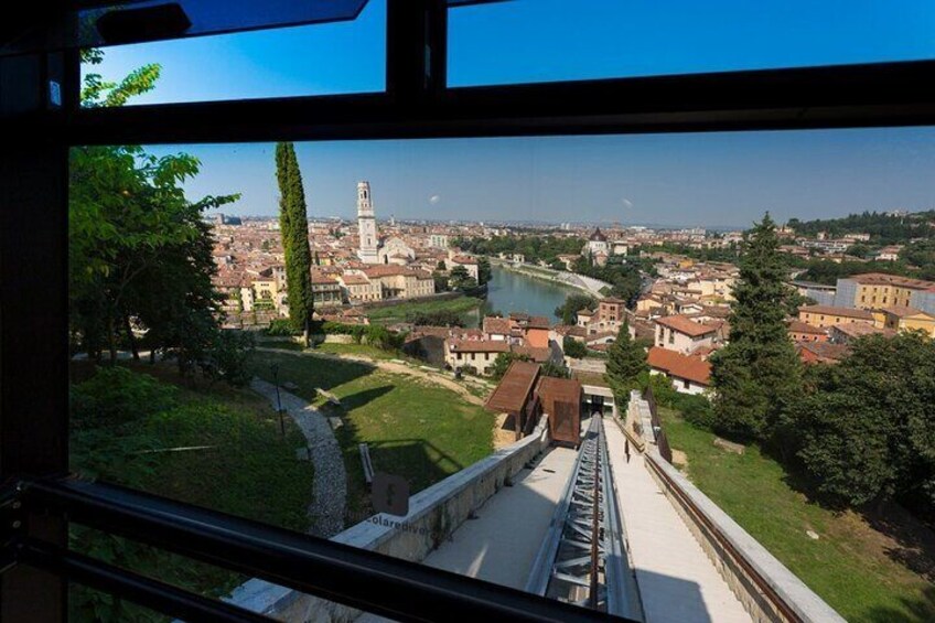 Ride with the cable car 
Verona food and wine walking tour