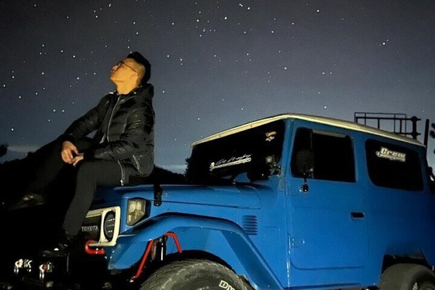 Night sky with your own 4WD Jeep