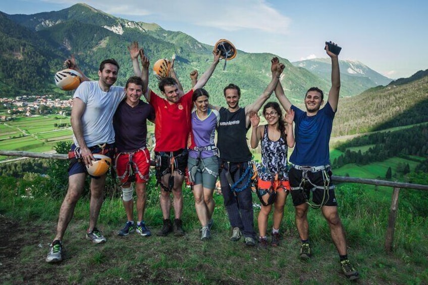 Group of happy people with wide-open hands, just finished the guided via Ferrata tour near Bled- Slovenia