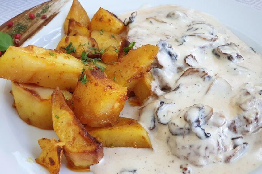 Pork cutlet with mushroom creamy sauce