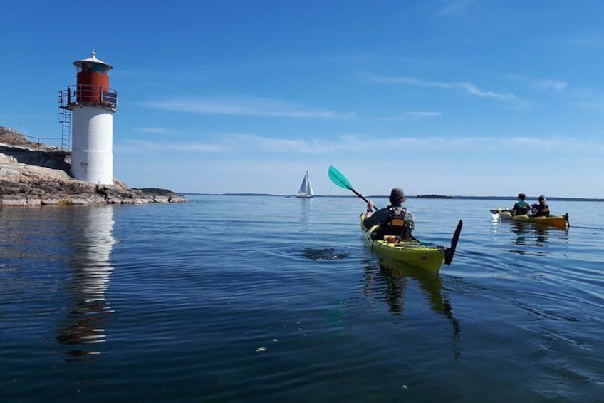 Slowly passing by a lighthouse