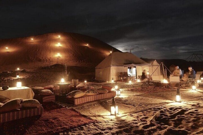 Magical Dinner in Marrakech Desert and camel ride at sunset with Transportation