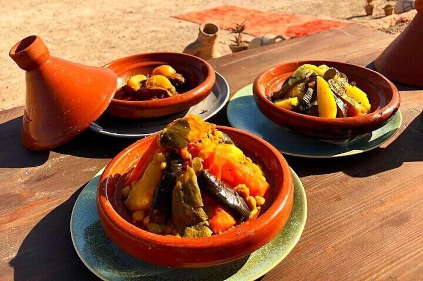 Magical Dinner in Marrakech Desert and camel ride at sunset with Transportation