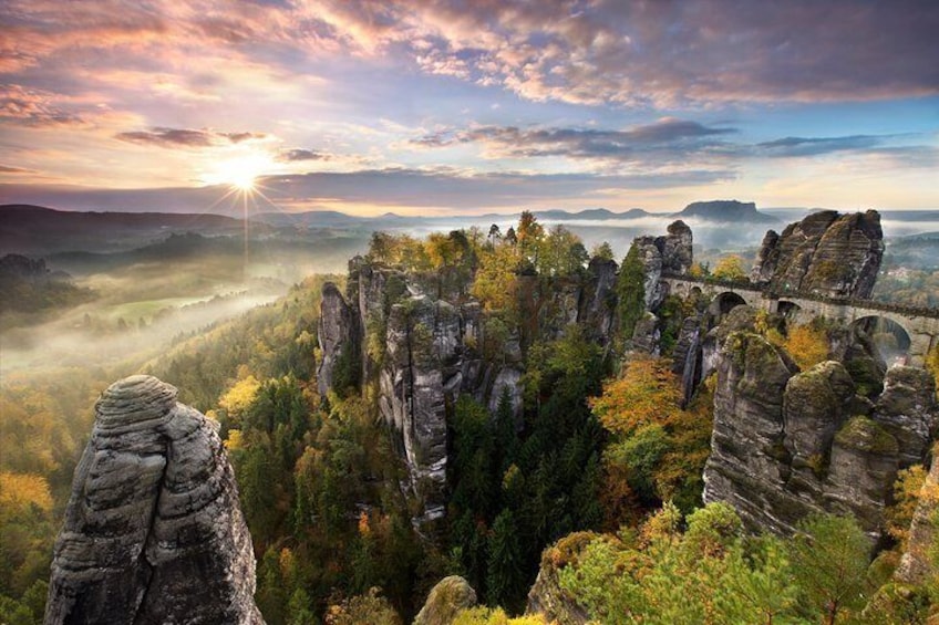 The highlight of the national park and every tour - Bastei bridge among rock formations, Germany.