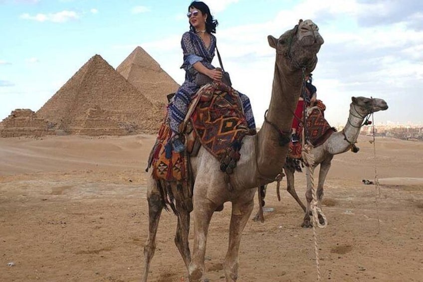 Giza pyramids ,sphinx ,ATV bike ,camel ride ,shopping tour & dinner show