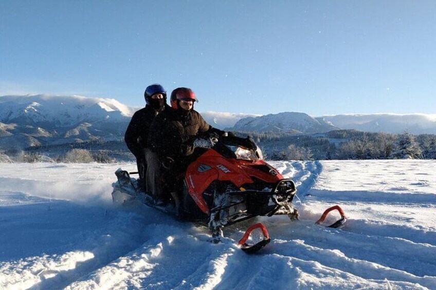 Snowmobiles are 2 seater so 2 persons can go together