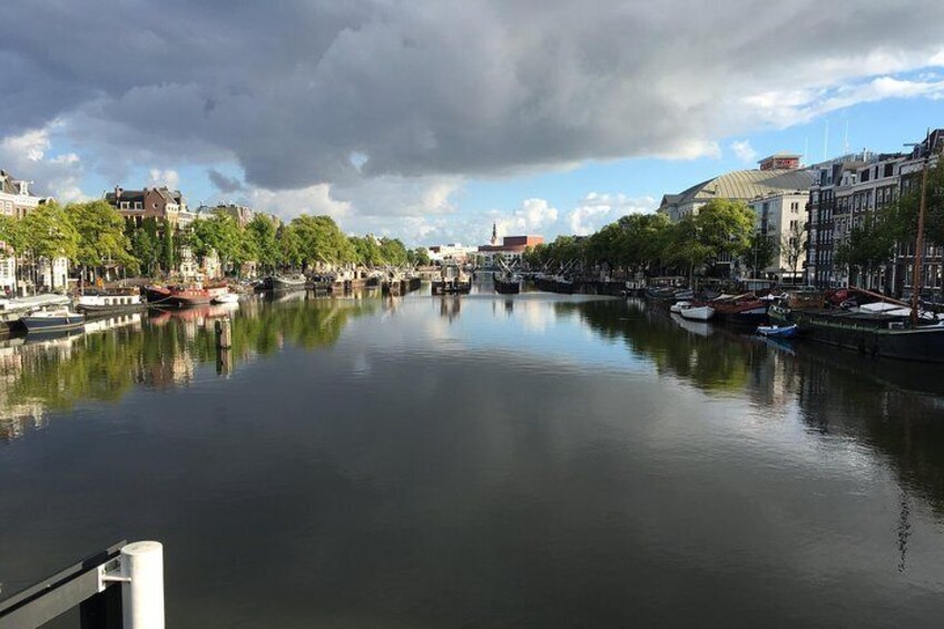 Clouds reflecting in the Amstel River