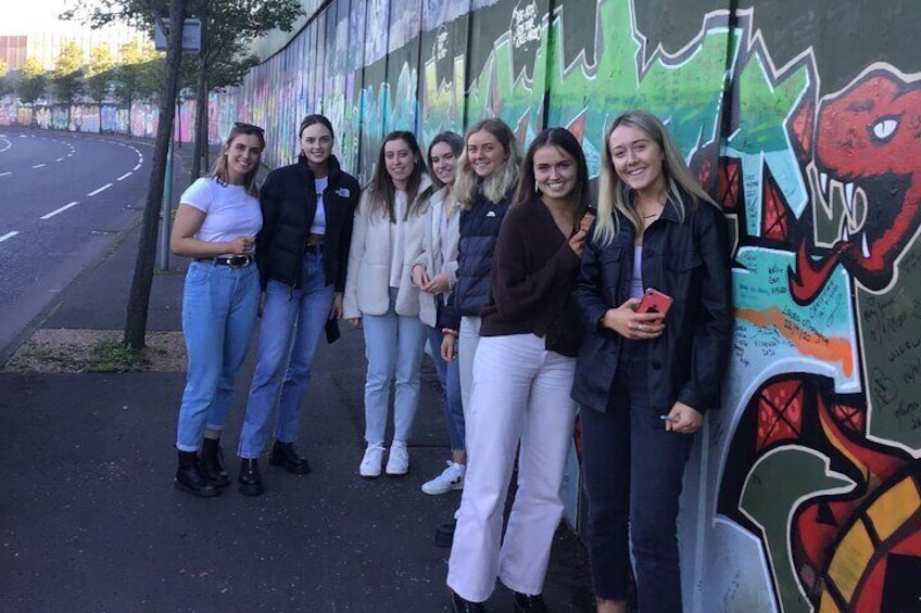 Girls at the pace wall in belfast 