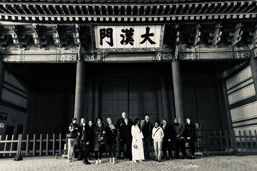 In front of a palace on our special annual tour with Minji the Ghost

