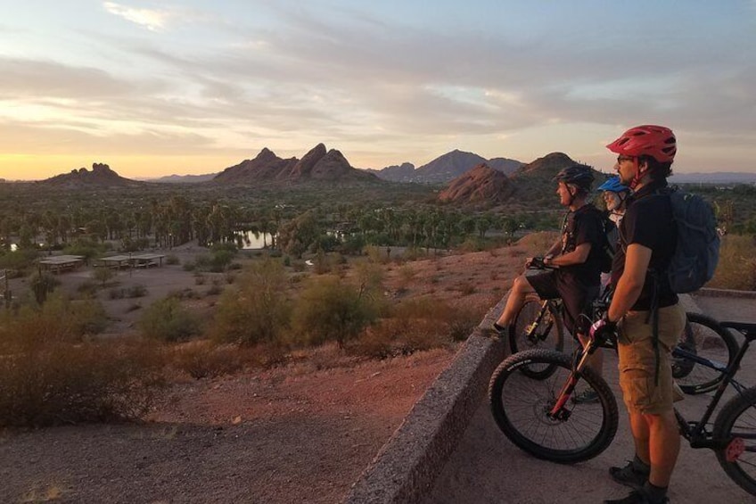 Check out the mountains in the background with the sun setting here in Phoenix, AZ. Ride with us.