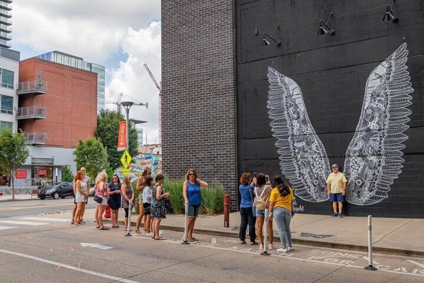 Learn about venues, shopping, and murals in the Gulch…depending on the line wait times we can definitely stop and get a picture at the Popular Angel Wing Mural!