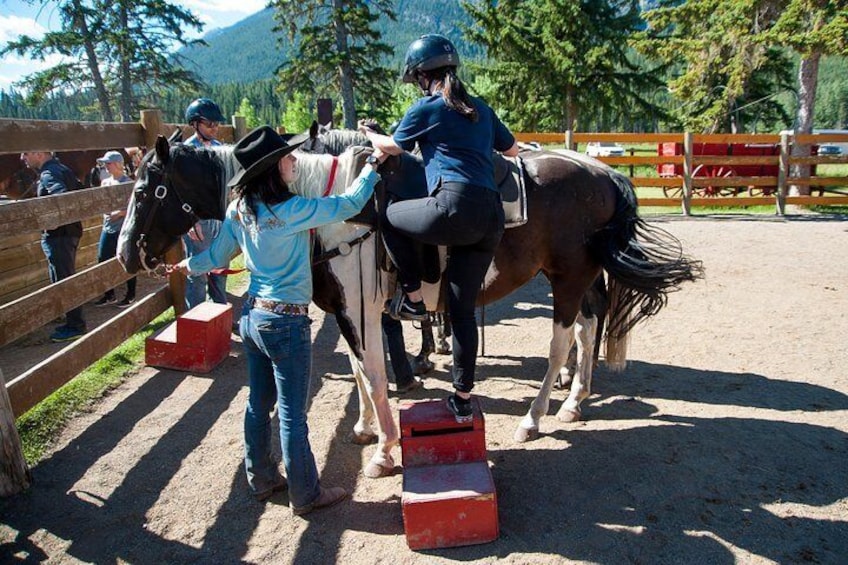 Your friendly guide will help you up onto your horse