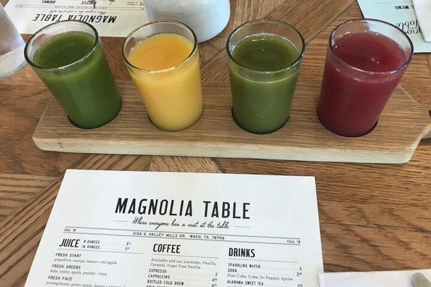 Show item 3 of 21. Juice flight at the Magnolia Table