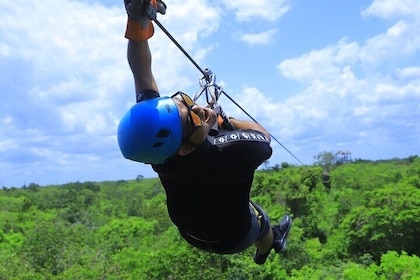 quad bike adventure, Ziplines, Cenote Swim, Snack & Transport Included.