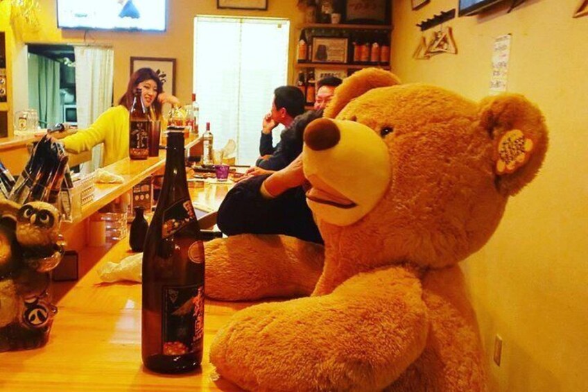 Eat with a drinking teddy bear. hahaha