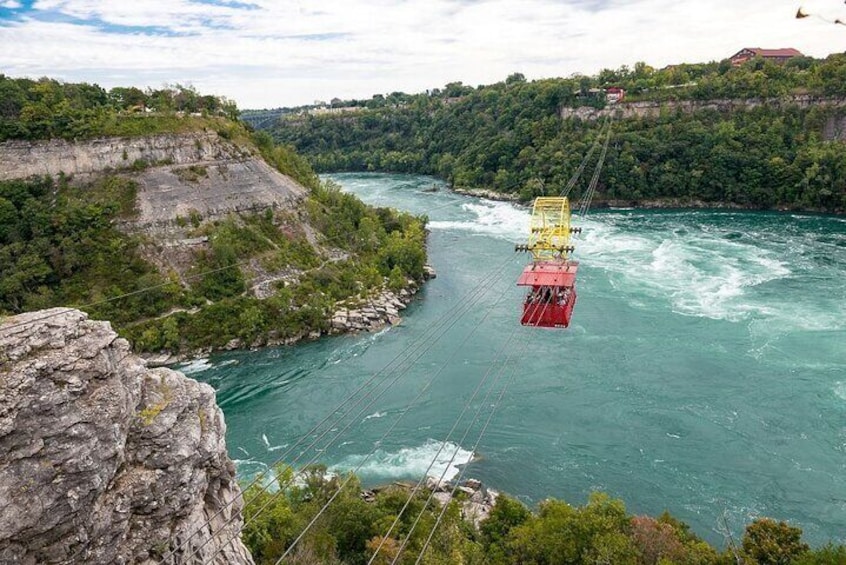Whirlpool rapids with the aerial cable car. It travels safely between two different points of the Canadian shore of the Niagara River over the spectacular Whirlpool