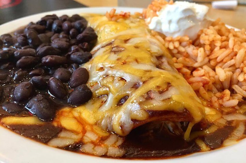 Mini smothered enchilada plate made just for us! Wash it down with the perfect margarita? Sure. Why not! It's included. 