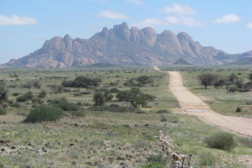 Show item 3 of 9. The adjacent Pontoc Mountains