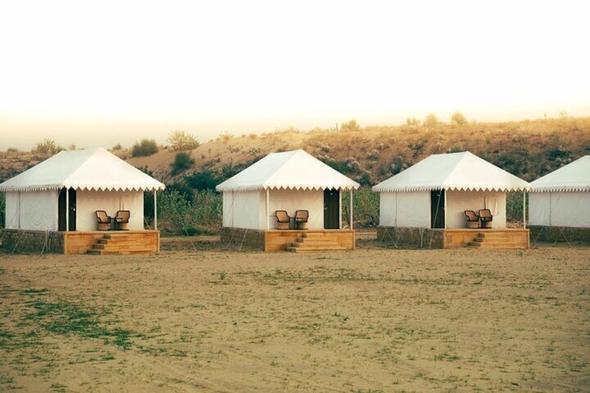 Overnight Stay in a luxury Camp with a cultural show & dinner.