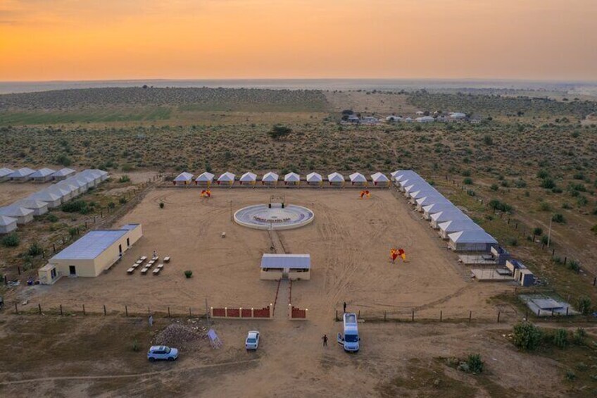 Overnight Stay in a luxury Camp with a cultural show & dinner.