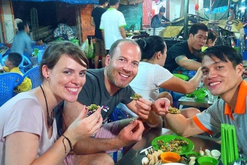 Enjoying street food in Ho Chi Minh City