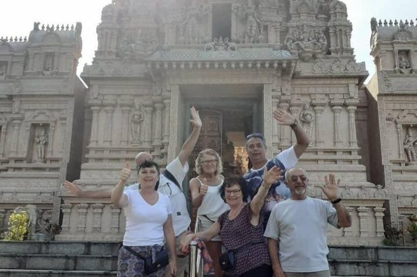 Happy photo moments by the temple entrance