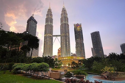 Petronas Twin Tower in the evening with local street tour
