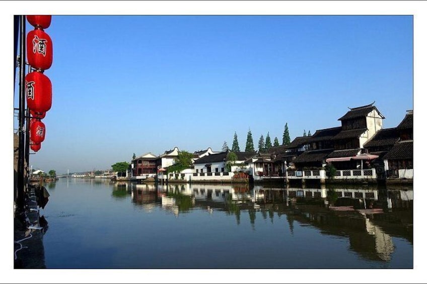 Private day tour to Zhujiajiao water town village and shanghai city market 