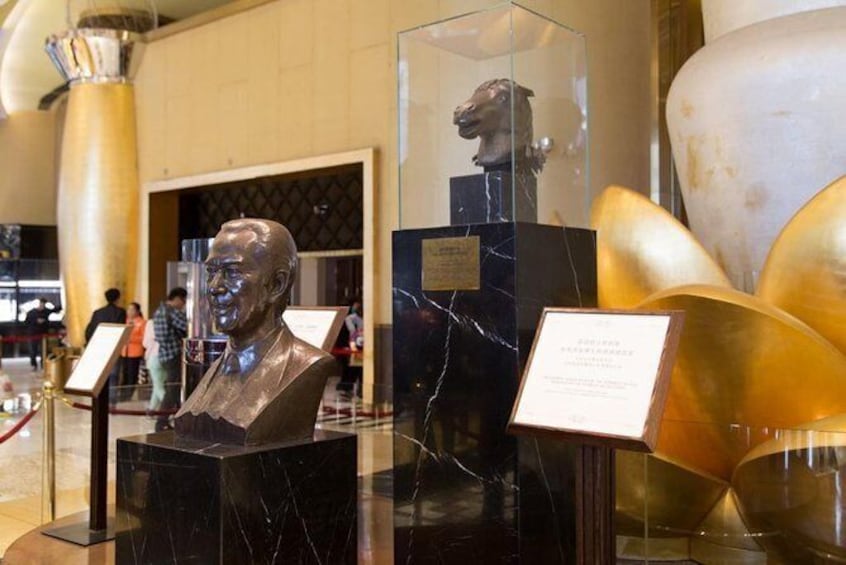 Show item 4 of 5. Stanley Ho Statue in Grand Lisboa: The king of Gambling