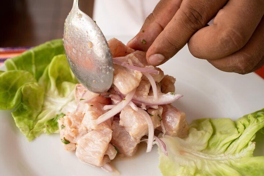 Peruvians make their national seafood dish Ceviche from fresh raw fish cured in lime and spiced with a variety of seasonings including chopped onions.