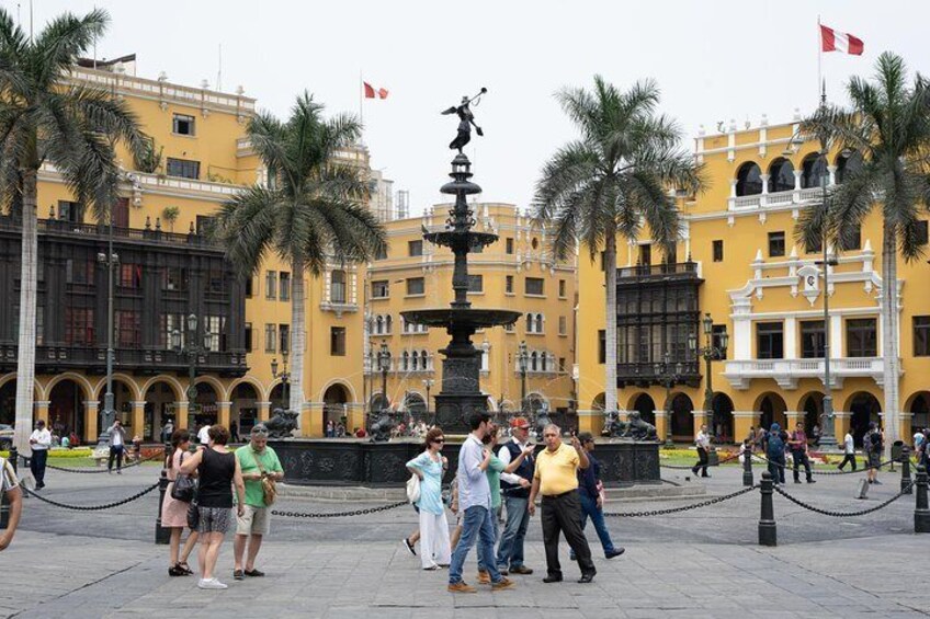 Travelers gather at the Main Square of Lima, a UNESCO World Heritage Site which was founded in 1535, to start the city walking tour and explore the historic center of Peru’s capital.