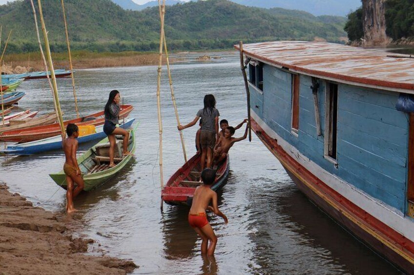 1 DAY Mekong Cruise to Pak Ou Caves. Kuang Si Waterfalls . Local Villages